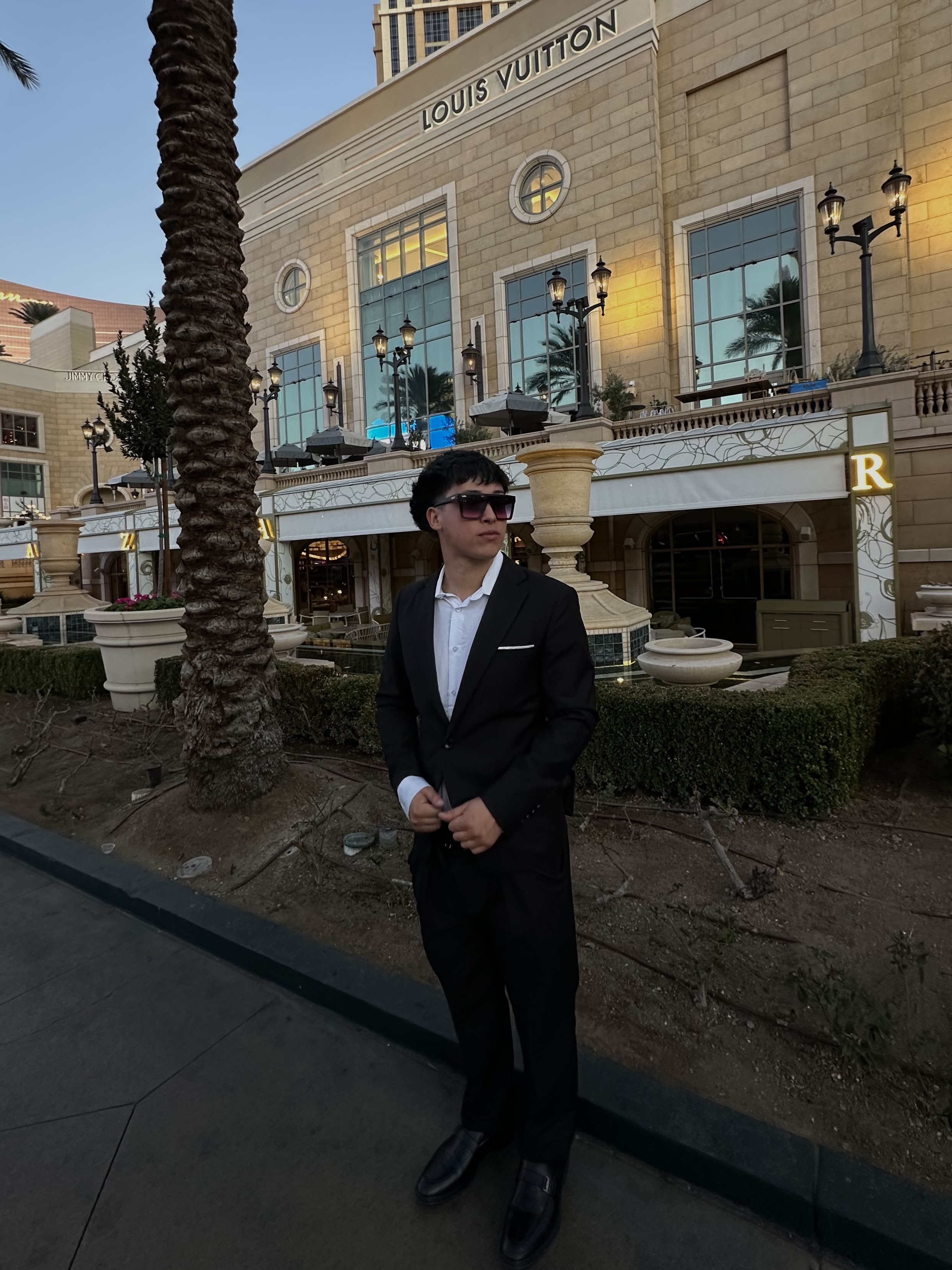 Suit in front of Louis Vuitton, Vegas